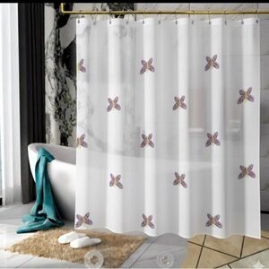 Polyester white with purple butterflies shower curtain.